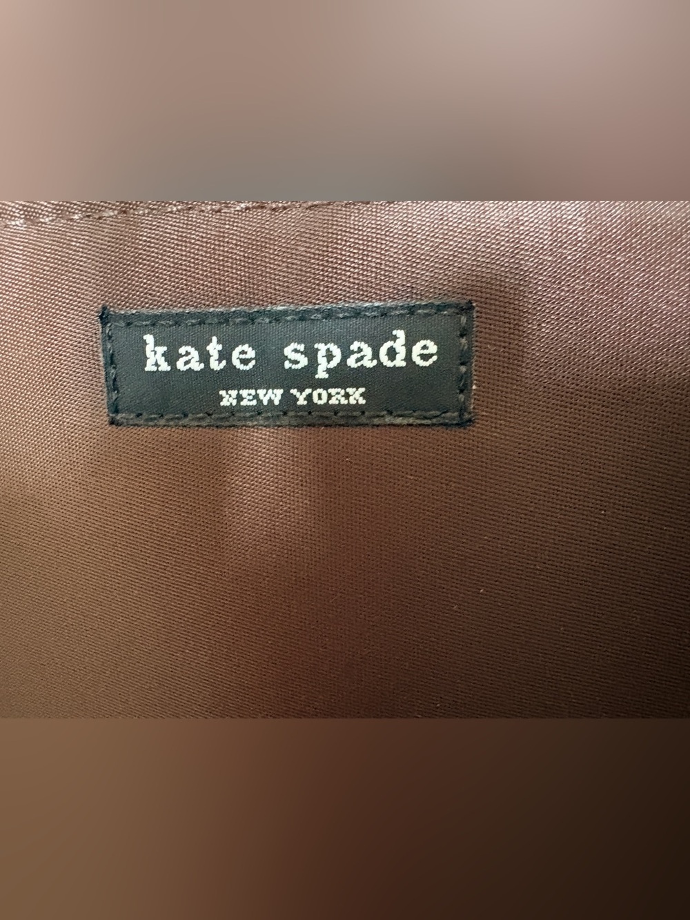 kate spade brown tote with black logo patch